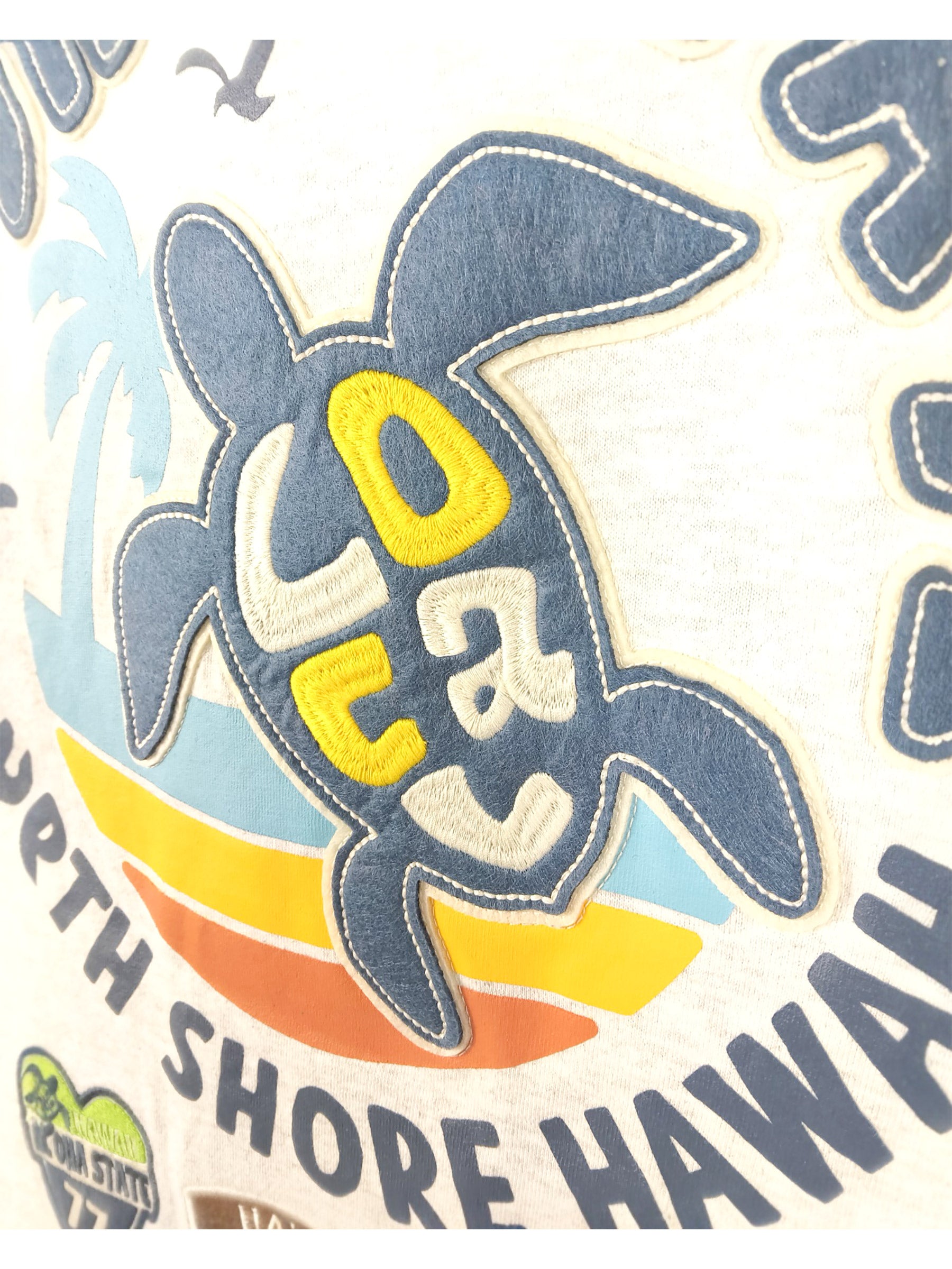 ホヌ柄切リ貼リワッペンTシャツ