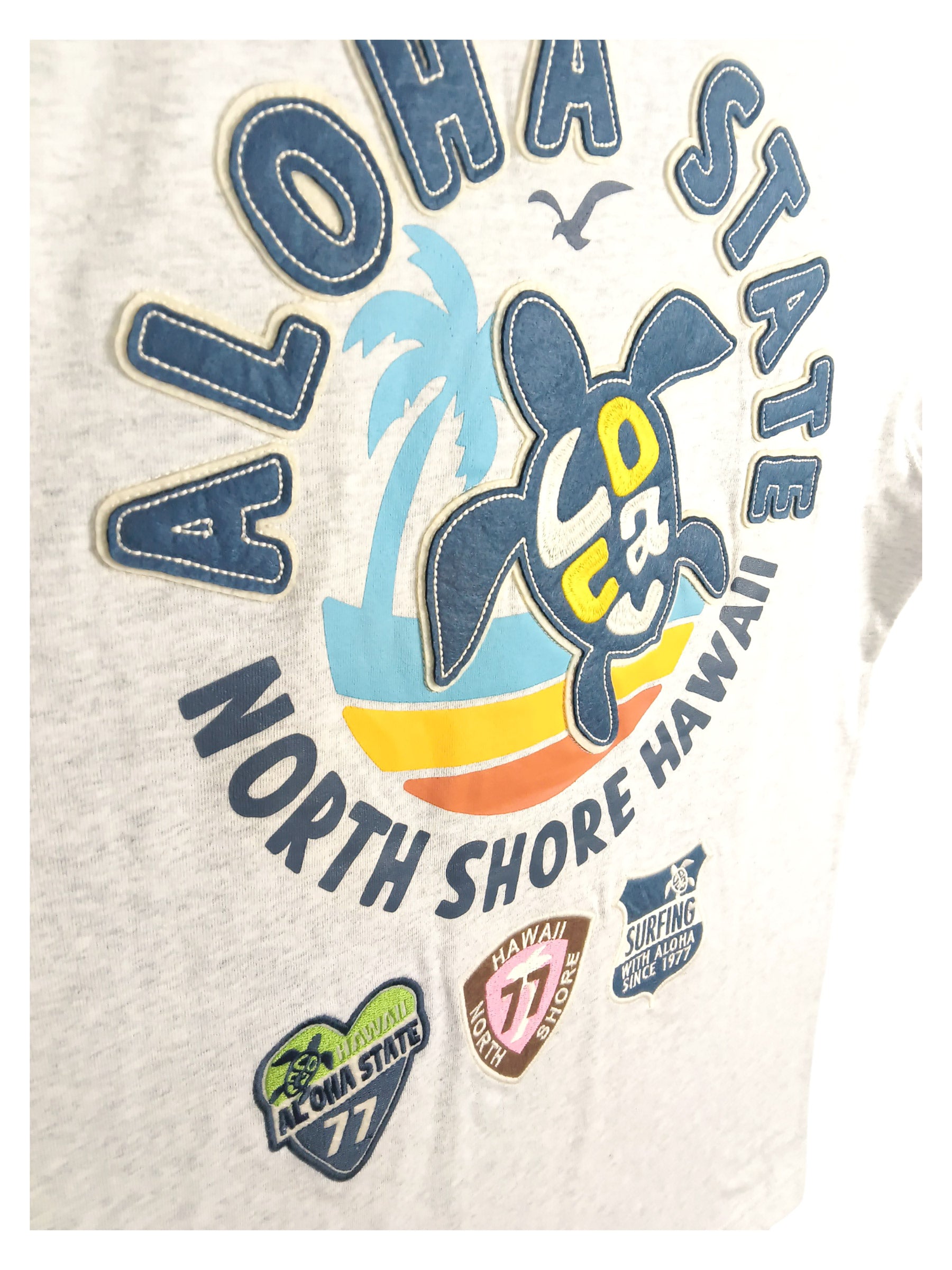 ホヌ柄切リ貼リワッペンTシャツ